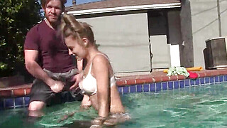 A guy gets lucky in the pool with his four naked friends around him Porn Video