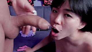 Transwoman ejaculates cum onto Asian girl face Porn Video