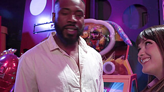 Brunette girlfriend fucked by black bf in public arcade Porn Video