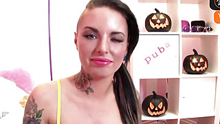 A tatted brown-haired with a ample butt wears a Porn Video