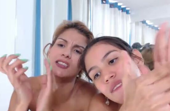 Two girls masturbate on the table