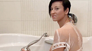 Busty Brunette Rubs Her Pussy In Bath Tub Porn Video
