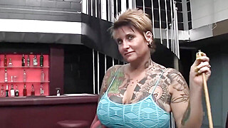 Big tit tattooed MILF sucks cock Porn Video